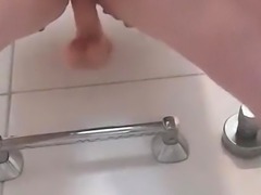 Busty amateur milf masturbates in the shower