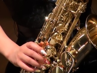 Kyoka Makimura plays the saxophone and shows off her hot