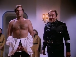 Buck Rogers vs Horny Females at Slave Auction