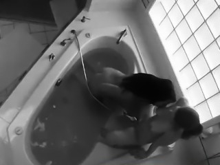 Two naked mormon lesbians kissing in bath
