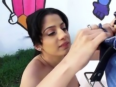 Nadia Ali is a chick with huge tits. She is placing her fingers inside her...