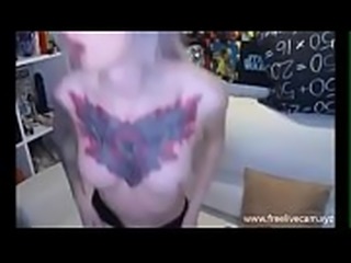 Beautiful tattooed teen fucks her both holes on live cam