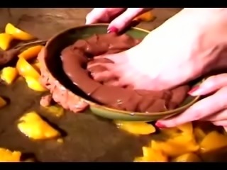 Dirty bitch uses various sweet stuff and fruit to smash them with her feet