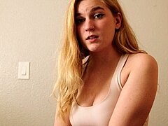 Blonde teen in solo action with her pussy